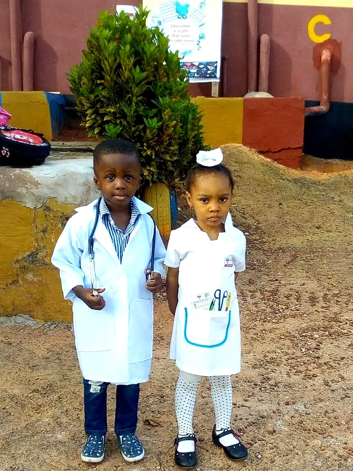 Two young pupils dressed as a doctor and a nurse