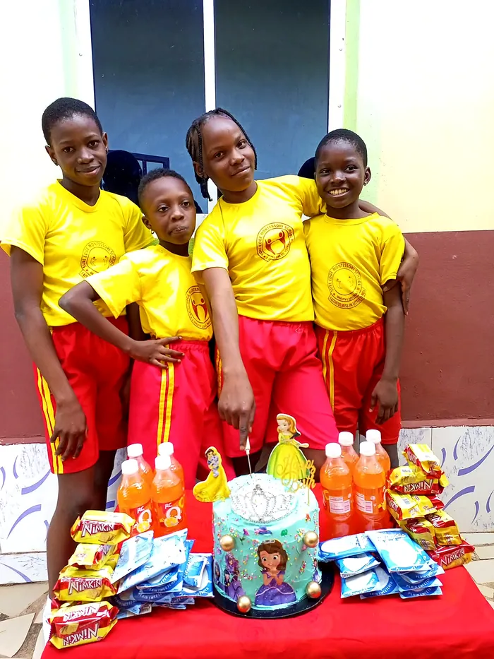 Three pupils in the school’s sports kit